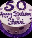 Purple Polka Dot 50th Birthday Cake,  Purple buttercream iced,   round decorated with purple polka dots.  Everything on this cake is EDIBLE.  (Serves 8-80 party slices)